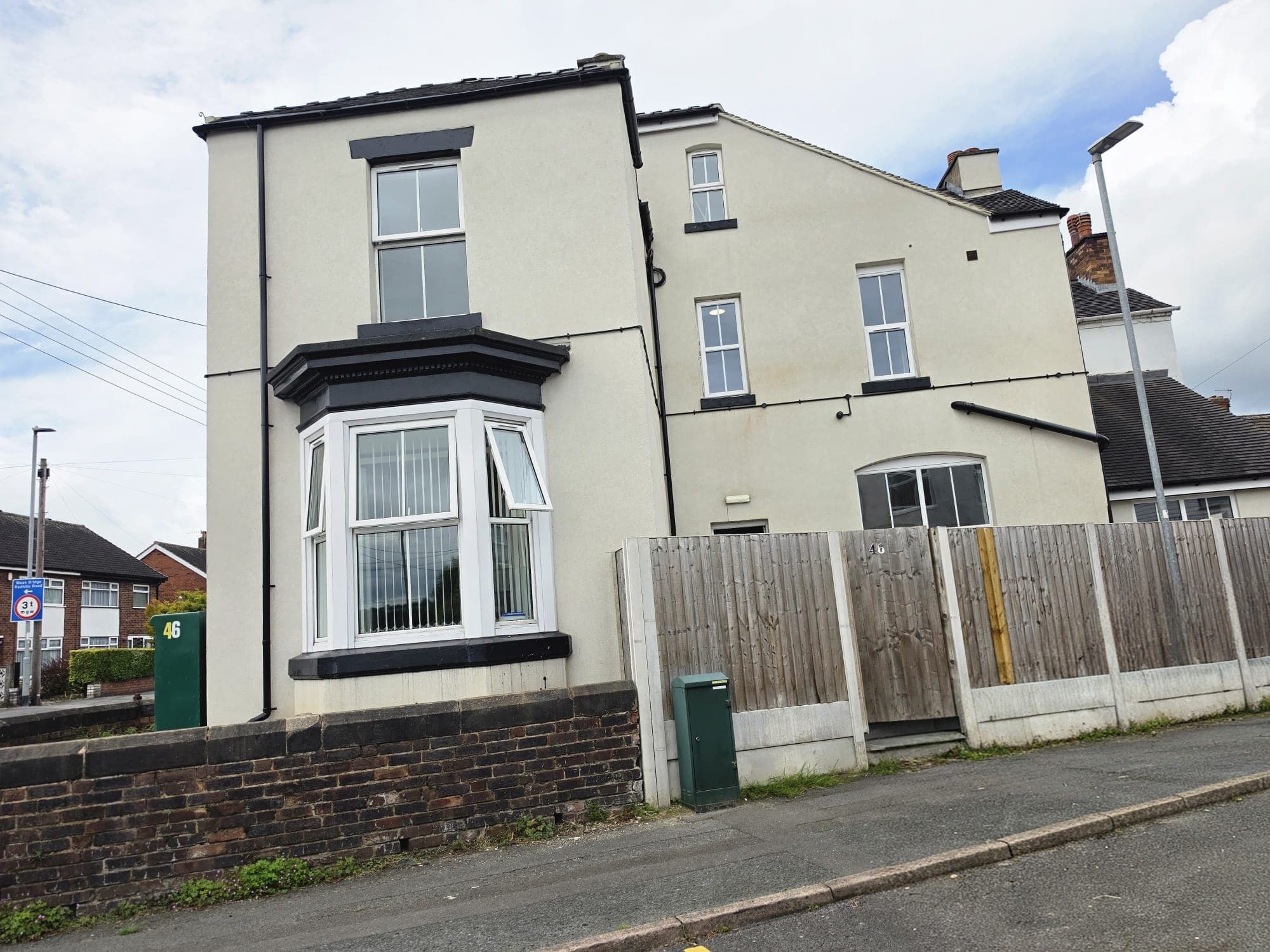 The exterior of a converted period property used for C2 residential care