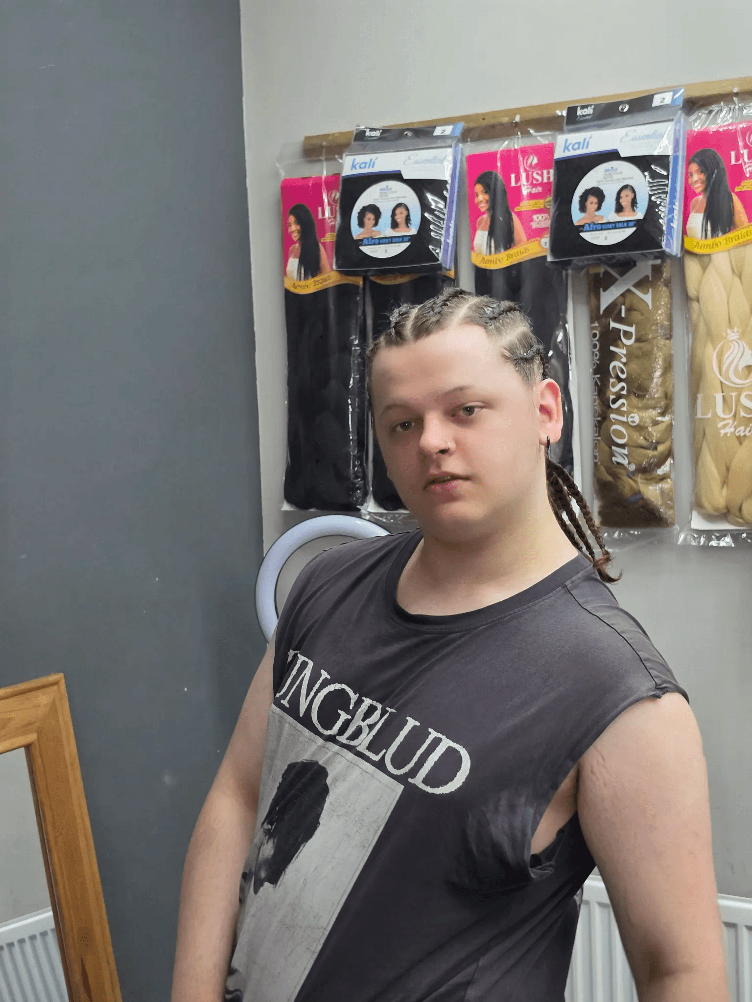 A haircut and personal style on EM’s terms